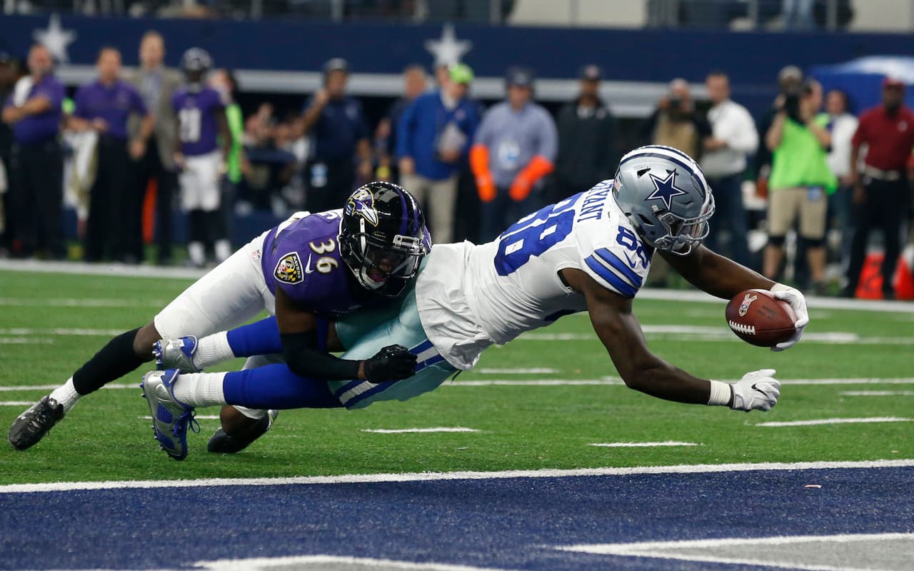 Baltimore Ravens cornerback Tavon Young (36) is unable to stop Dallas Cowboys' Dez Bryant (88) from leaping into the end zone after catching a pass for a touchdown in the second half of an NFL football game, Sunday, Nov. 20, 2016, in Arlington, Texas. (AP Photo/Michael Ainsworth)
