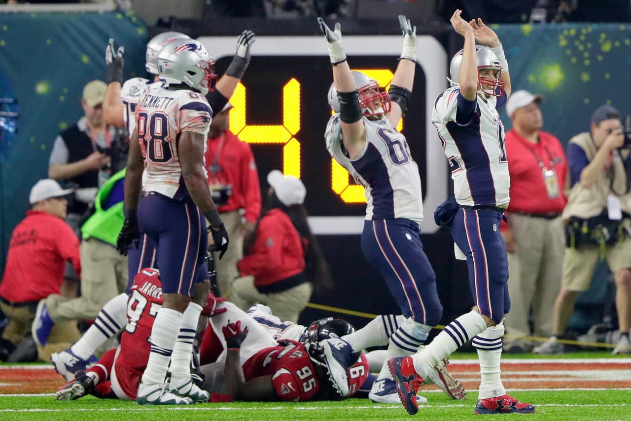 HOUSTON, TX - FEBRUARY 05: Tom Brady #12 of the New England Patriots reacts after defeating the Atlanta Falcons 34-28 in overtime to win Super Bowl 51 at NRG Stadium on February 5, 2017 in Houston, Texas. (Photo by Jamie Squire/Getty Images)