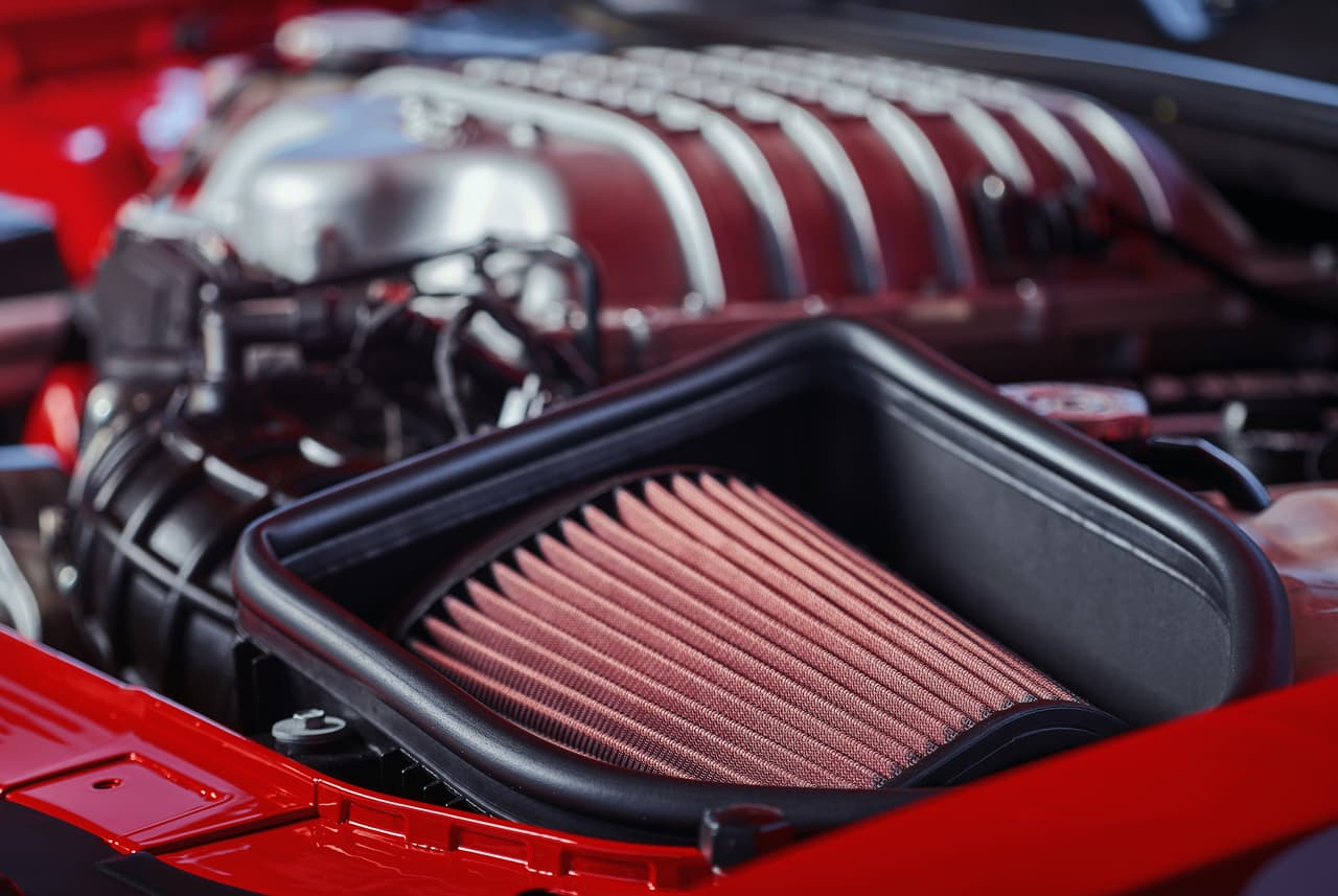 A low-restriction air filter is nestled in the top-sealed Air-Grabber™ cold-air intake box to feed the 6.2-liter supercharged HEMI® Demon V-8 engine in the Dodge Challenger SRT Demon.