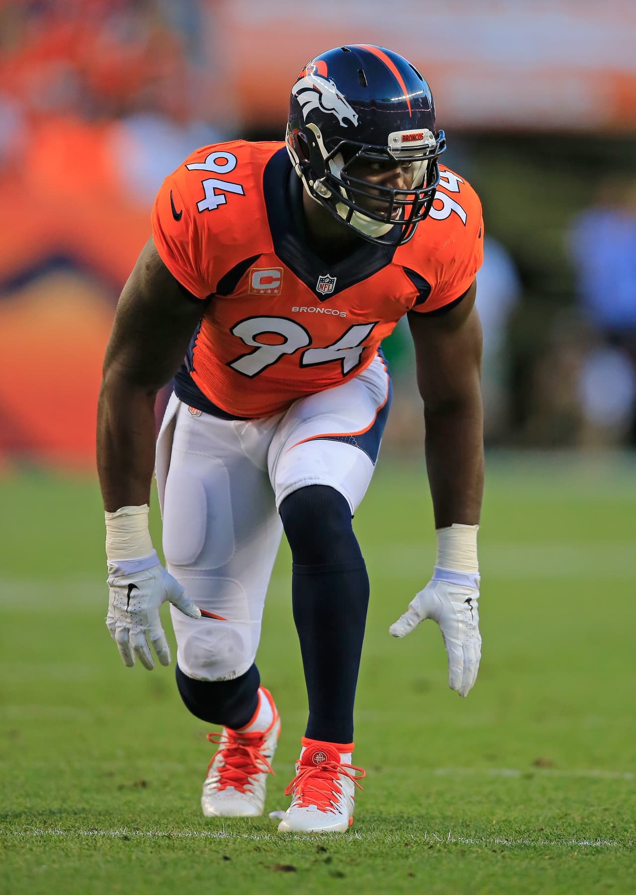 DENVER, CO - SEPTEMBER 07: Defensive end DeMarcus Ware #94 of the Denver Broncos rushes the line of scrimmage against the Indianapolis Colts at Sports Authority Field at Mile High on September 7, 2014 in Denver, Colorado. The Broncos defeated the Colts 31-24. (Photo by Doug Pensinger/Getty Images)