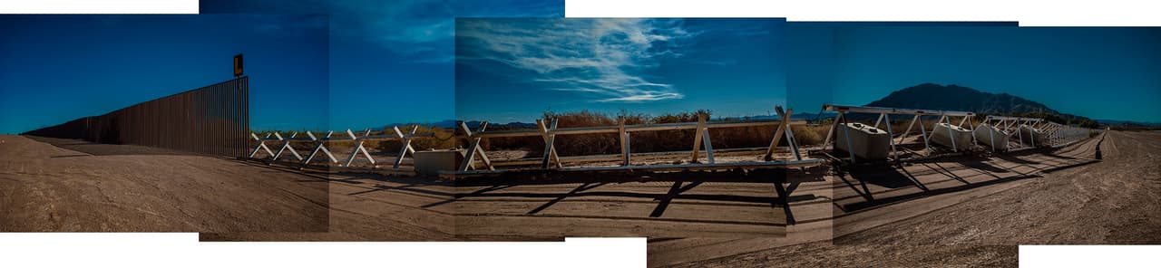<b>The fence becomes a barrier in the Imperial Valley of California</b>. Not all the gaps in the California border wall are due to rugged terrain. In this desert valley on the edge of cultivated areas west of Calexico, the border fence ends and is replaced by a simple barrier to block vehicles. Here the Border Patrol is virtually absent. Very occasionally agents ask about the nationality and the profession of people in the area.