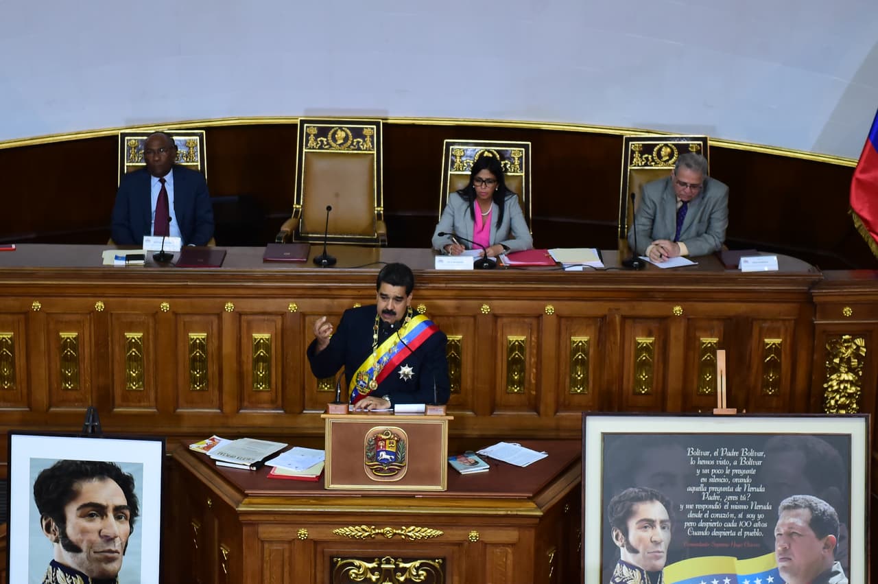 Venezuelan President Nicolas Maduro addresses the all-powerful pro-Maduro assembly which has been placed over the National Assembly and tasked with rewriting the constitution, in Caracas on August 10, 2017. Recent demonstrations in Venezuela have stemmed from anger over the installation of the all-powerful Constituent Assembly that many see as a power grab by the unpopular President Maduro. The dire economic situation also has stirred deep bitterness as people struggle with skyrocketing inflation and shortages of food and medicine. / AFP PHOTO / RONALDO SCHEMIDT (Photo credit should read RONALDO SCHEMIDT/AFP/Getty Images)