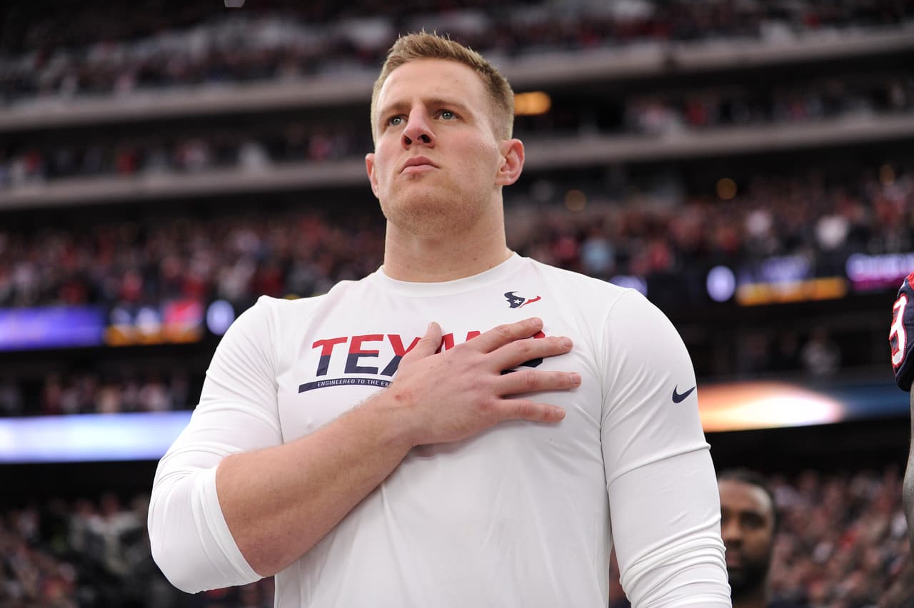 Houston Texans J.J. Watt stands on the sidelines during anthem before the first half of an AFC Wild Card NFL game between the Houston Texans and the Oakland Raiders, Saturday, Jan. 7, 2017, in Houston. (AP Photo/Eric Christian Smith)