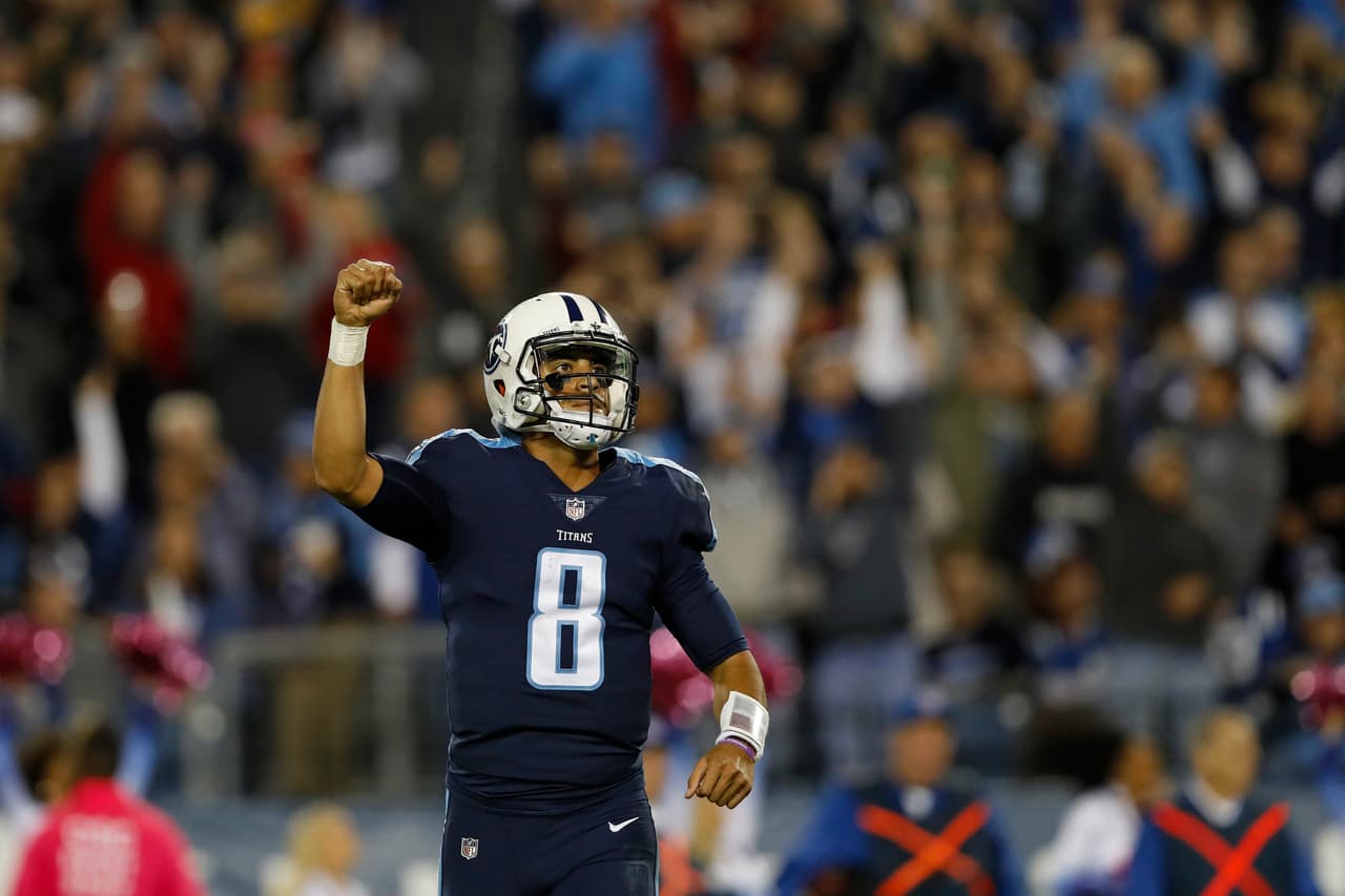 Tennessee Titans quarterback Marcus Mariota (8) celebrates after leading his team to a touchdown during a week 6 NFL football game against the Indianapolis Colts on Monday, Oct. 16, 2017 in Nashville, Tenn. Tennessee won 36-22. (Aaron M. Sprecher via AP)