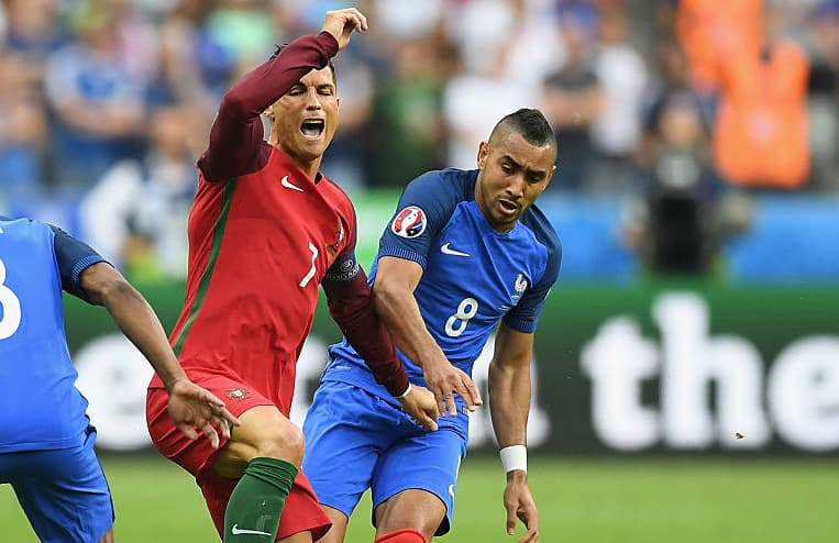 Payet y Cristiano Ronaldo durante la Euro