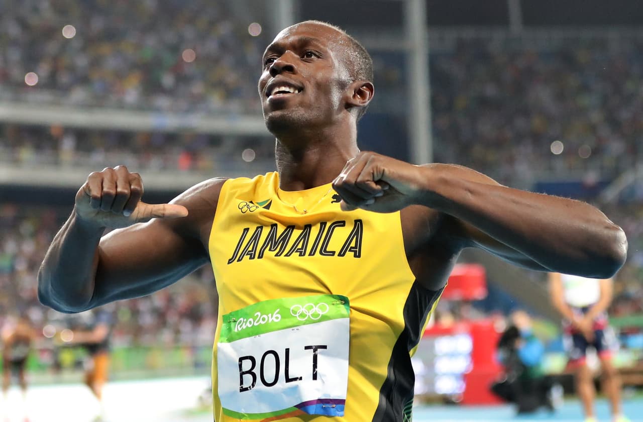 Usain Bolt from Jamaica celebrates after crossing the line to win the gold medal in the men's 200-meter final during the athletics competitions of the 2016 Summer Olympics at the Olympic stadium in Rio de Janeiro, Brazil, Thursday, Aug. 18, 2016. (AP Photo/Lee Jin-man)