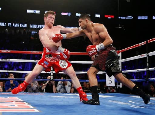 Saúl 'Canelo' Álvarez aplicó cloroformo puro a Amir Khan y defendió con éxito el cinturón medio del Consejo Mundial de Boxeo. El mexicano noqueó al británico en seis rounds en la T-Mobile de Las Vegas.