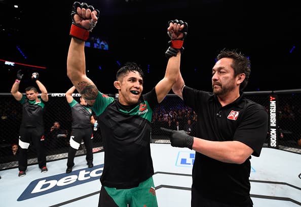 MEXICO CITY, MEXICO - NOVEMBER 05: Erik Perez of Mexico celebrates his victory over Felipe Arantes of Brazil in their bantamweight bout during the UFC Fight Night event at Arena Ciudad de Mexico on November 5, 2016 in Mexico City, Mexico. (Photo by Jeff Bottari/Zuffa LLC/Zuffa LLC via Getty Images)
