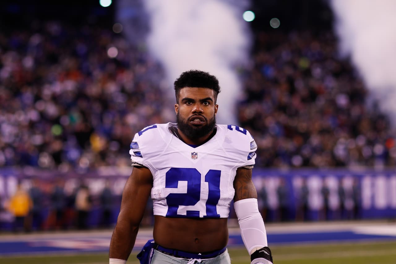 Dallas Cowboys running back Ezekiel Elliott (21) looks on prior to an NFL football game against the New York Giants on Sunday, Dec. 11, 2016 in East Rutherford, N.J. New York won 10-7. (Aaron M. Sprecher via AP)