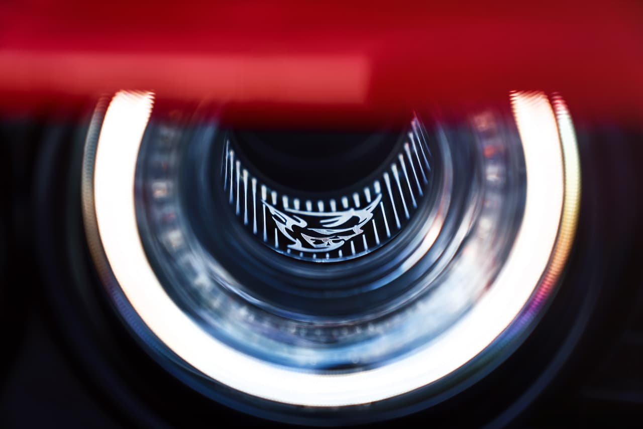 The 2018 Dodge Challenger SRT Demon’s driver-side functional Air-Catcher headlamp features a Demon logo.