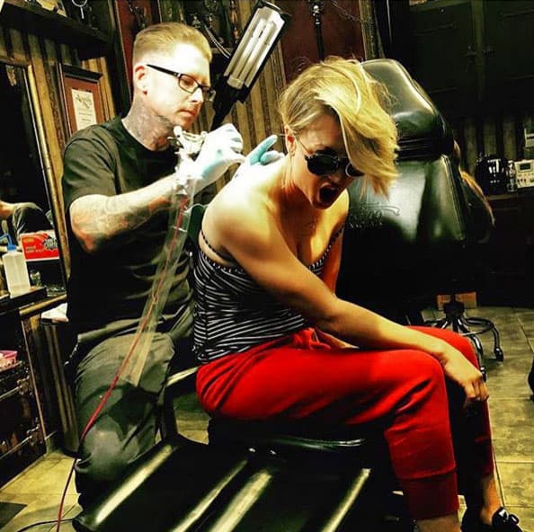 En plena dolorosa sesión.