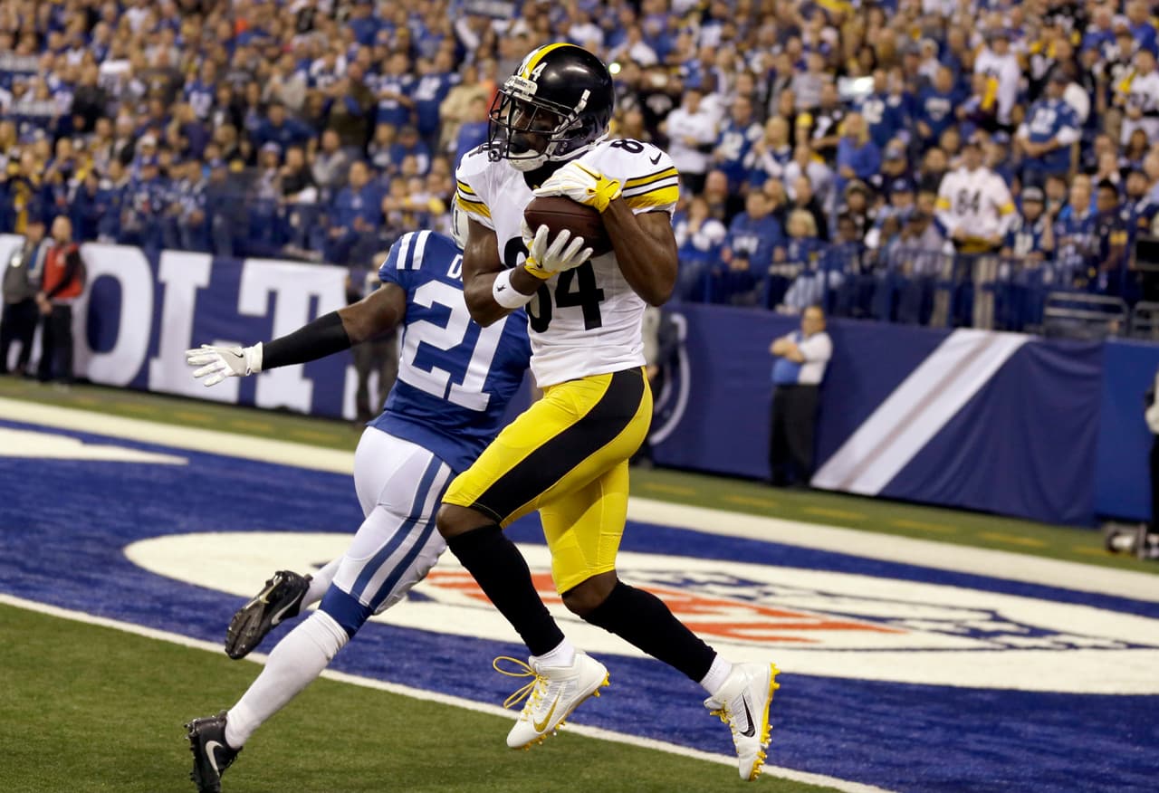 Pittsburgh Steelers' Antonio Brown (84) catches a touchdown pass as Indianapolis Colts cornerback Vontae Davis (21) defends during the first half an NFL football game Thursday, Nov. 24, 2016, in Indianapolis. (AP Photo/Michael Conroy)