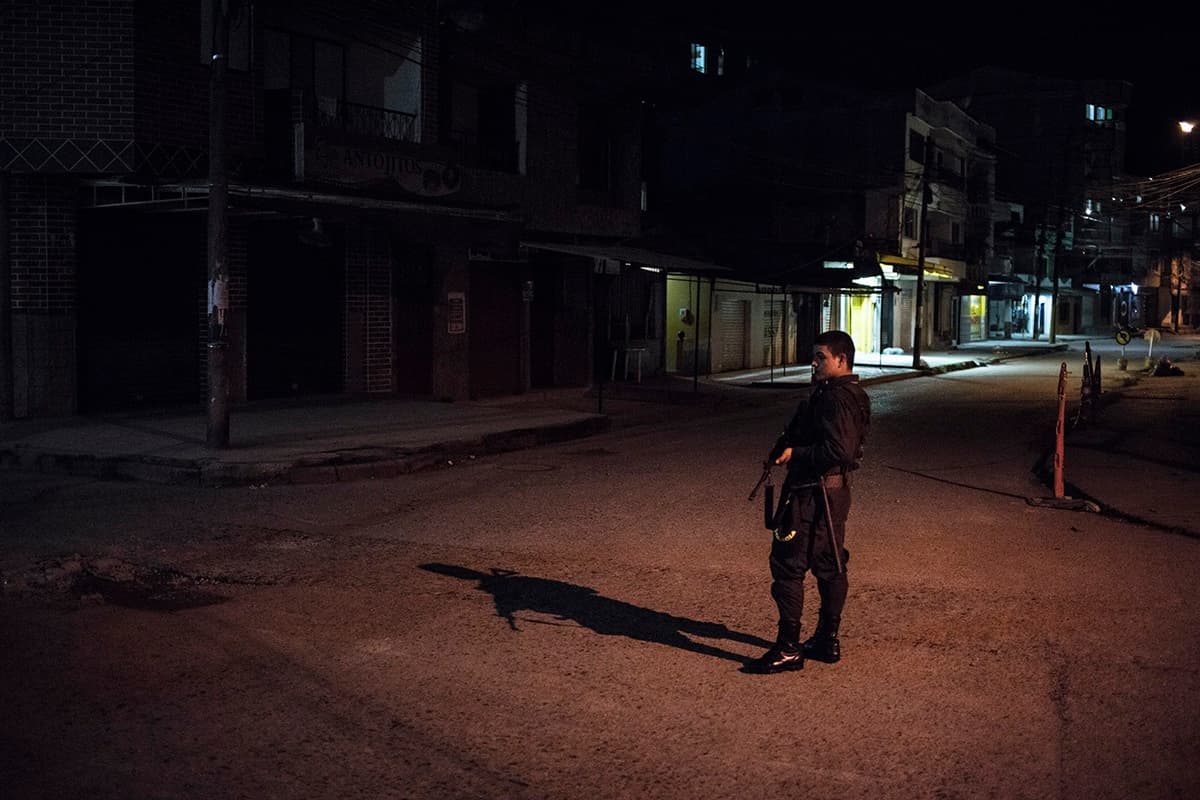 A police guard on duty in the empty streets of Quibdó, capital of Chocó department, during an armed paramilitary strike that left several soldiers dead in April, 2016.