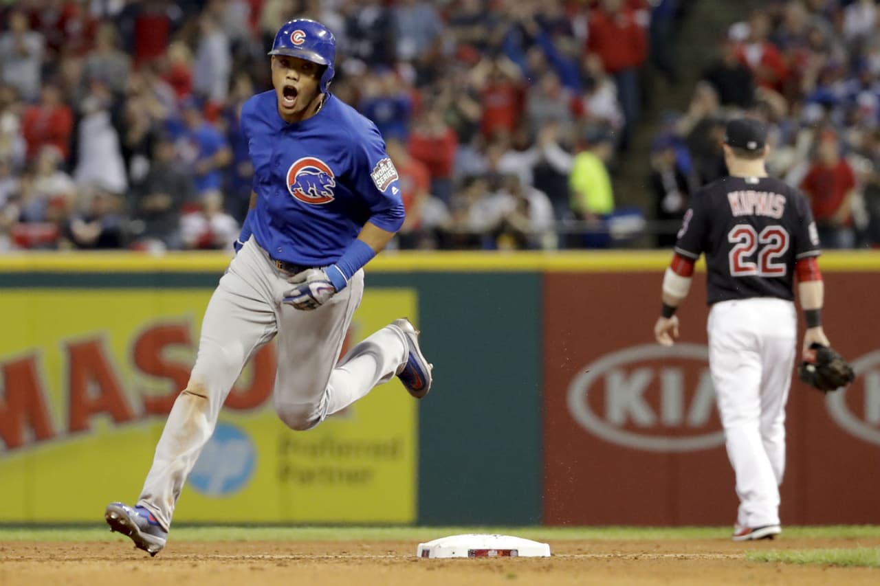 Addison Russell pegó el primer grand slam de los Cubs en una Serie Mundial.