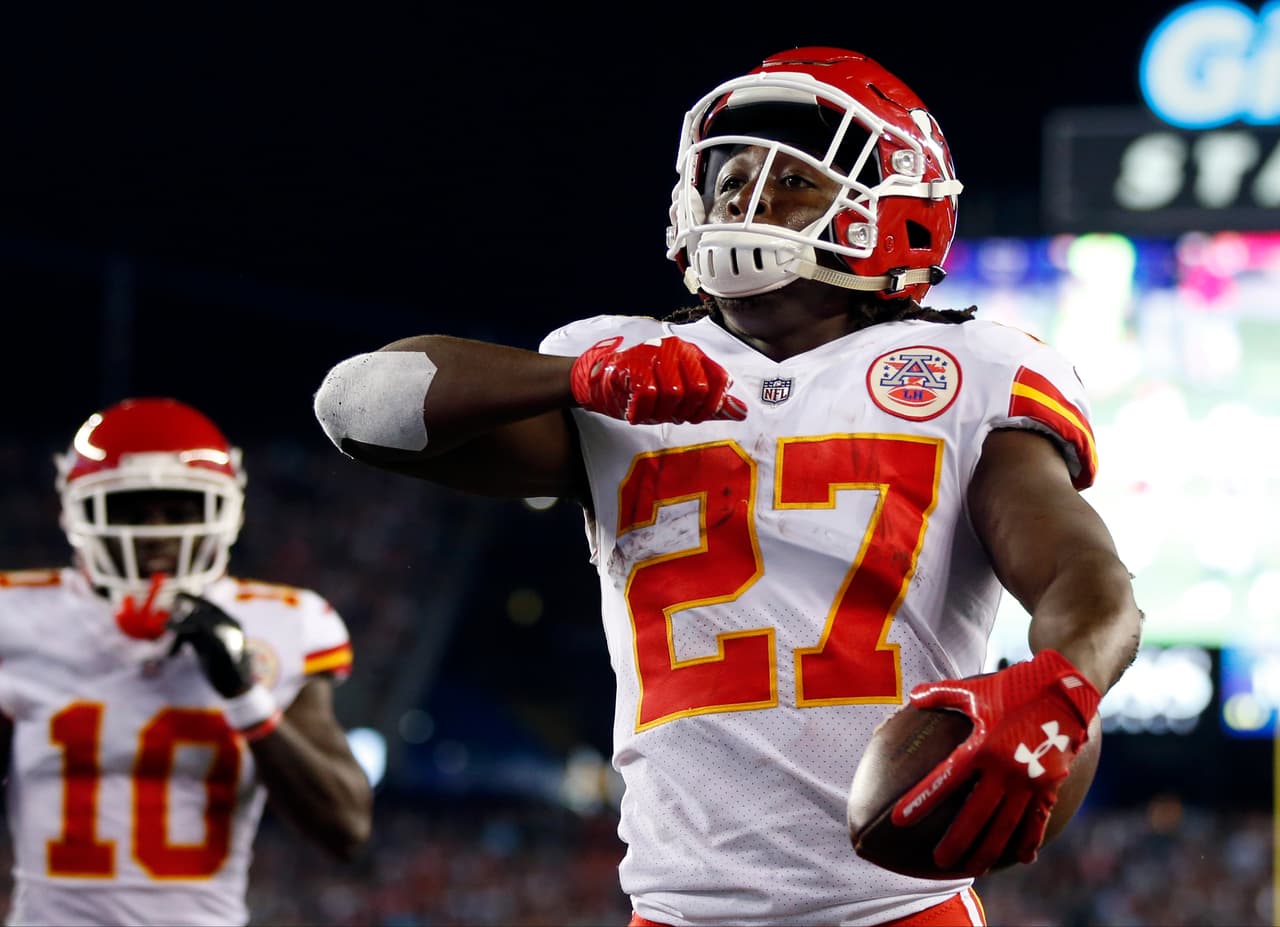 Kansas City Chiefs running back Kareem Hunt (27) celebrates his touchdown against the New England Patriots during the first half of an NFL football game, Thursday, Sept. 7, 2017, in Foxborough, Mass. (AP Photo/Michael Dwyer)