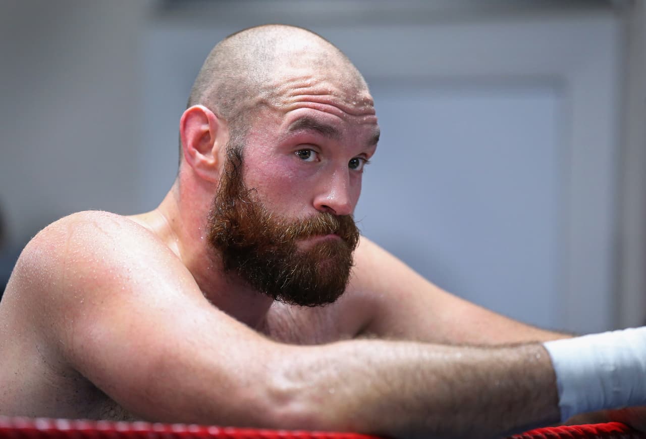 BOLTON, ENGLAND - NOVEMBER 06: Tyson Fury looks on during a training session at Team Fury Gym ahead of his fight with Dereck Chisora on November 6, 2014 in Bolton, England. (Photo by Alex Livesey/Getty Images)