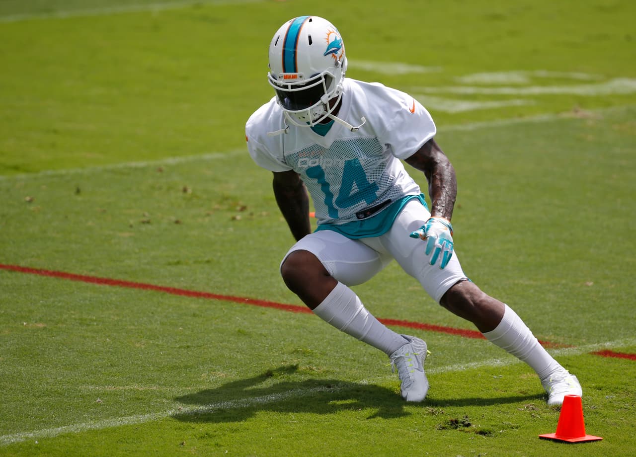 Miami Dolphins wide receiver Jarvis Landry runs through drills during an NFL organized team activities football practice, Wednesday, May 31, 2017, at the Dolphins training facility in Davie, Fla. (AP Photo/Wilfredo Lee)