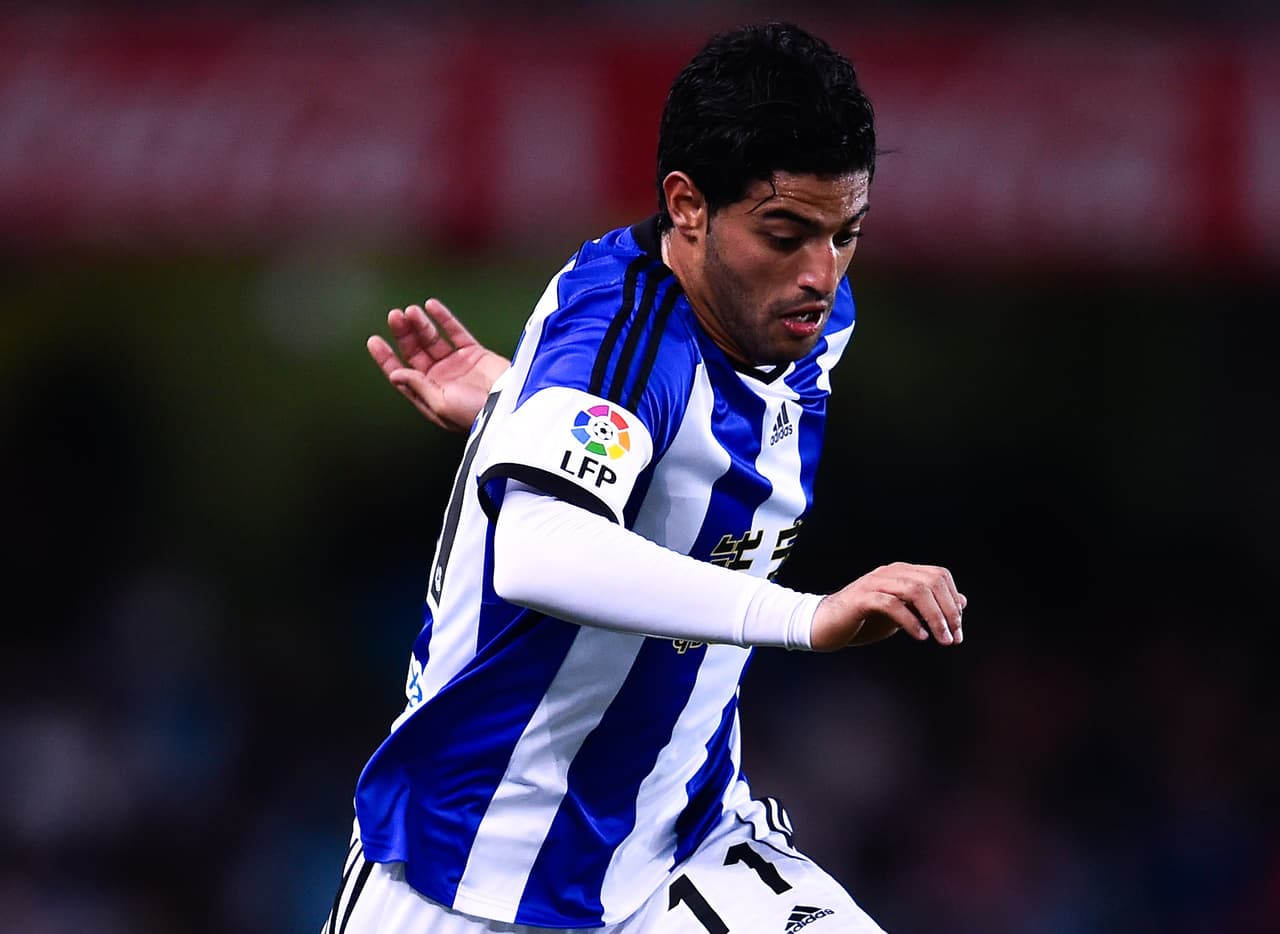 SAN SEBASTIAN, SPAIN - NOVEMBER 28: Carlos Vela Garrido of Real Sociedad runs with the ball during the La Liga match between Real Socided and Elche FC at Estadio Anoeta on November 28, 2014 in San Sebastian, Spain. (Photo by David Ramos/Getty Images)