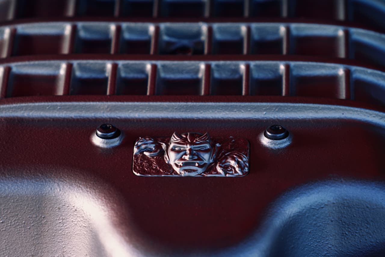 Custom diecast Demon emblem located on the cover the 6.2-liter supercharged HEMI® Demon V-8 engine.