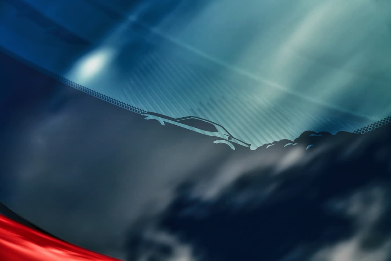 The 2018 Dodge Challenger SRT Demon’s windshield includes an image of the SRT Demon doing a burnout.