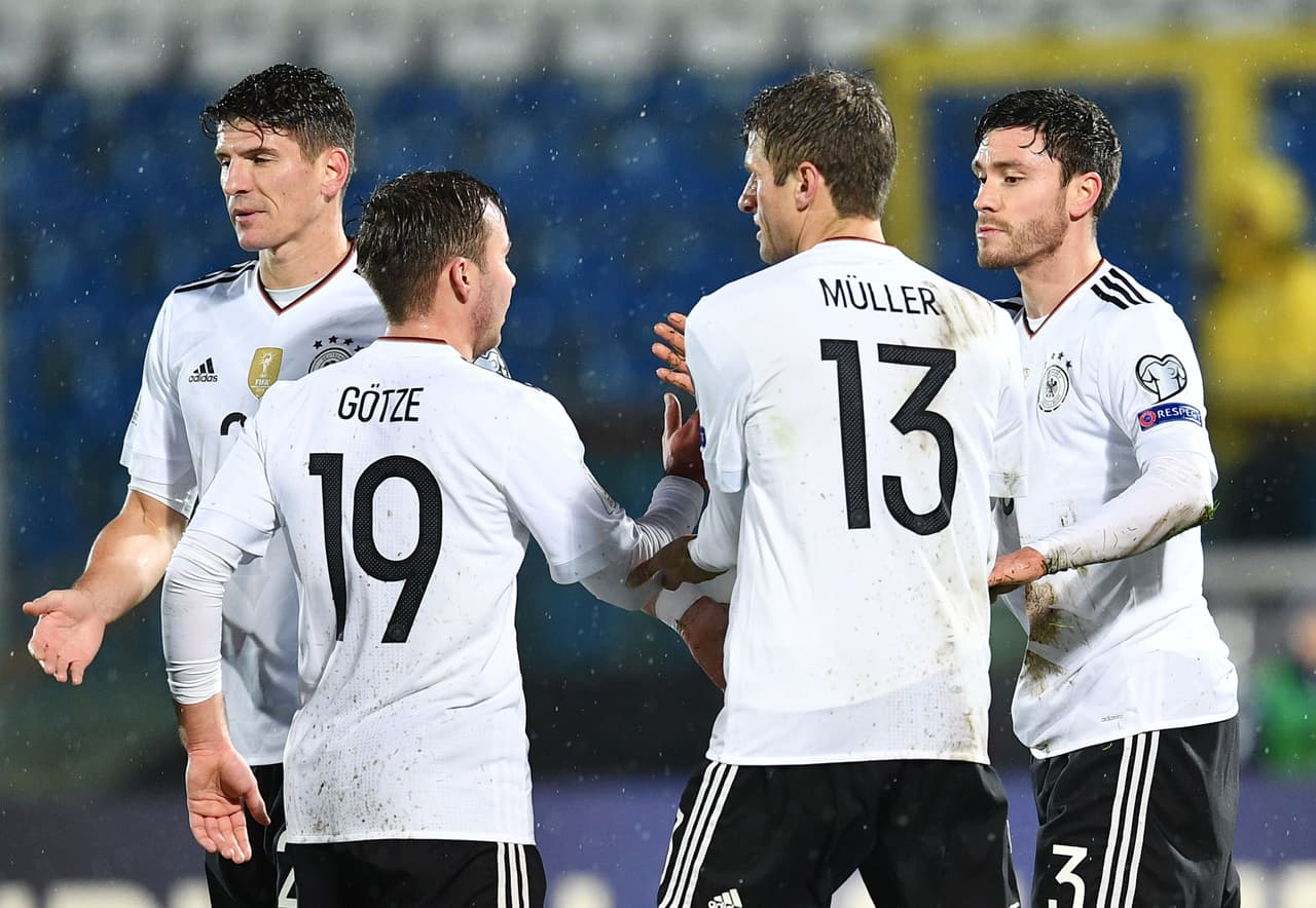 German defender Jonas Hector (R) celebrates with teammates after scoring during the World Cup 2018 qualifying soccer match San Marino vs Germany at the San Marino stadium in Serravalle on November 11, 2016. / AFP / VINCENZO PINTO (Photo credit should read VINCENZO PINTO/AFP/Getty Images)