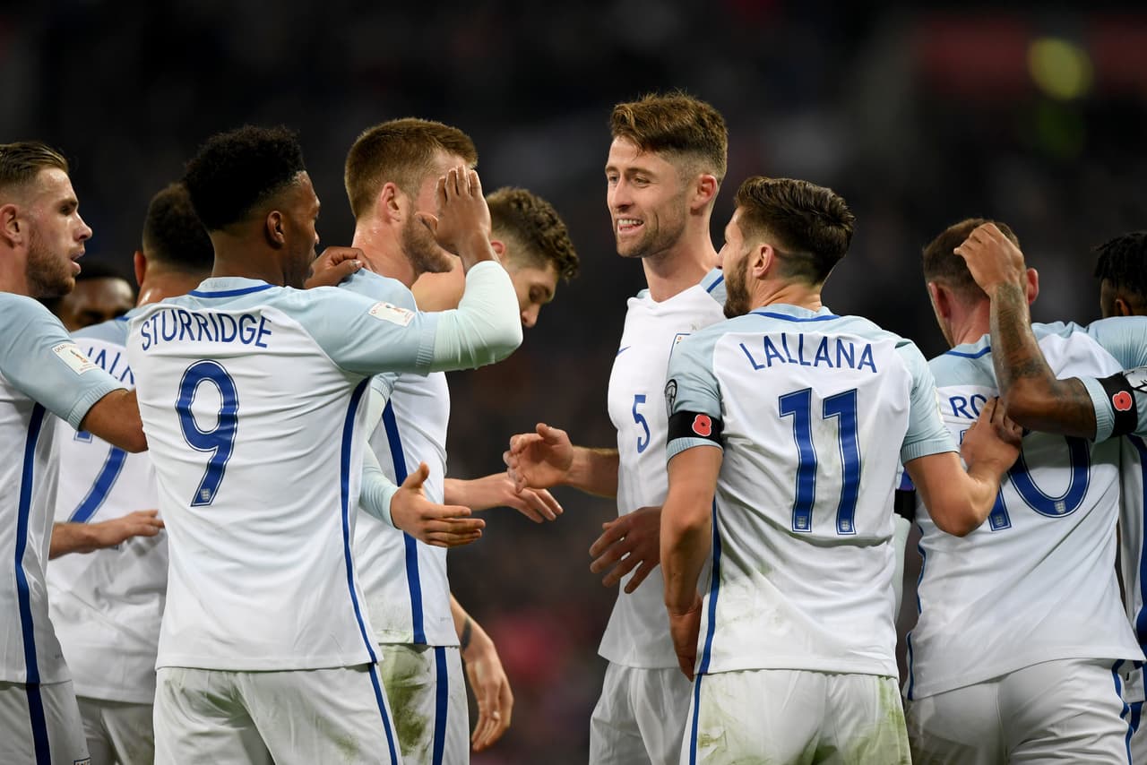 LONDON, ENGLAND - NOVEMBER 11: Gary Cahill of England (5) celebrates with team mates after scoring their third goal during the FIFA 2018 World Cup qualifying match between England and Scotland at Wembley Stadium on November 11, 2016 in London, England. (Photo by Shaun Botterill/Getty Images)