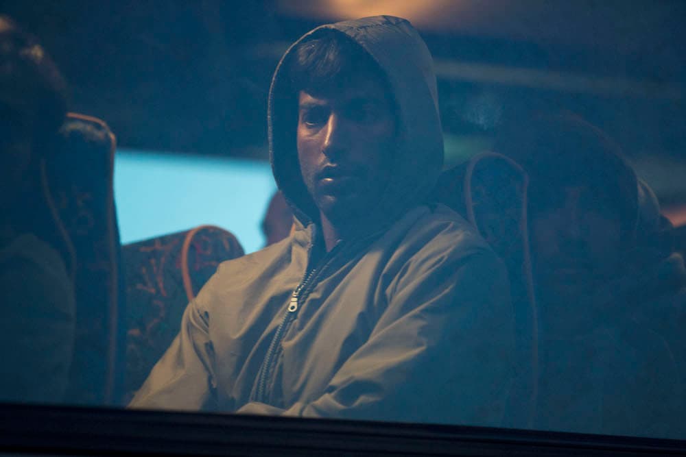 Los migrantes, todos hombres, fueron llevados al puerto en autobuses desde el campo de retención de Moria, a unas seis millas