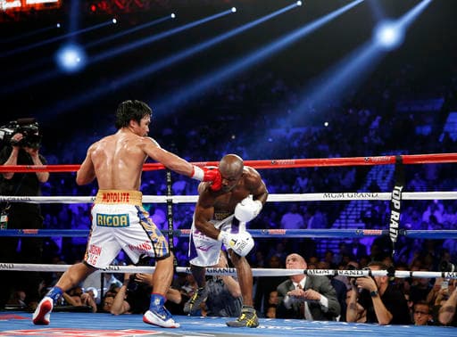 Manny Pacquiao dominó a Timothy Bradley y lo venció por decisión unánime en lo que sería su última pelea como boxeador profesional.
