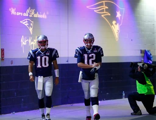 Los Patriotas dirigiéndose hacia el emparrillado.