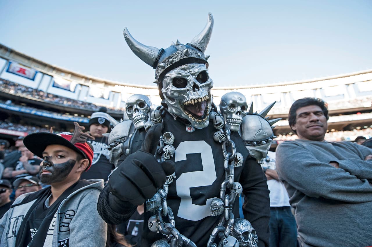 SAN DIEGO, CA - DECEMBER 18: An Oakland Raiders fan reacts en route to the Raiders 19-16 win over the San Diego Chargers at Qualcomm Stadium on December 18, 2016 in San Diego, California. (Photo by Donald Miralle/Getty Images)