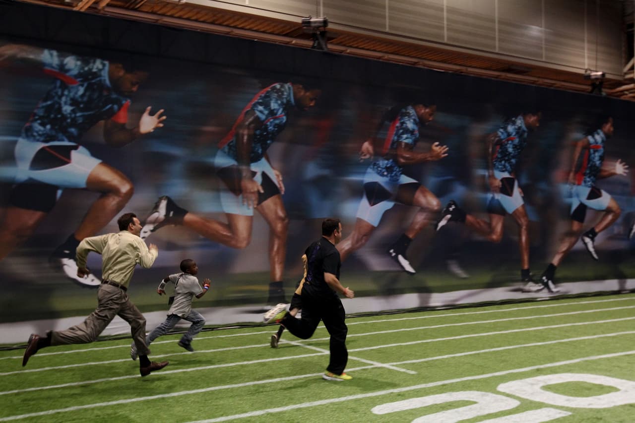 NEW ORLEANS, LA - JANUARY 31: Fans attend the Super Bowl XLVII NFL Fan Experience at Ernest N. Morial Convention Center on January 31, 2013 in New Orleans, Louisiana. (Photo by Justin Heiman/Getty Images)