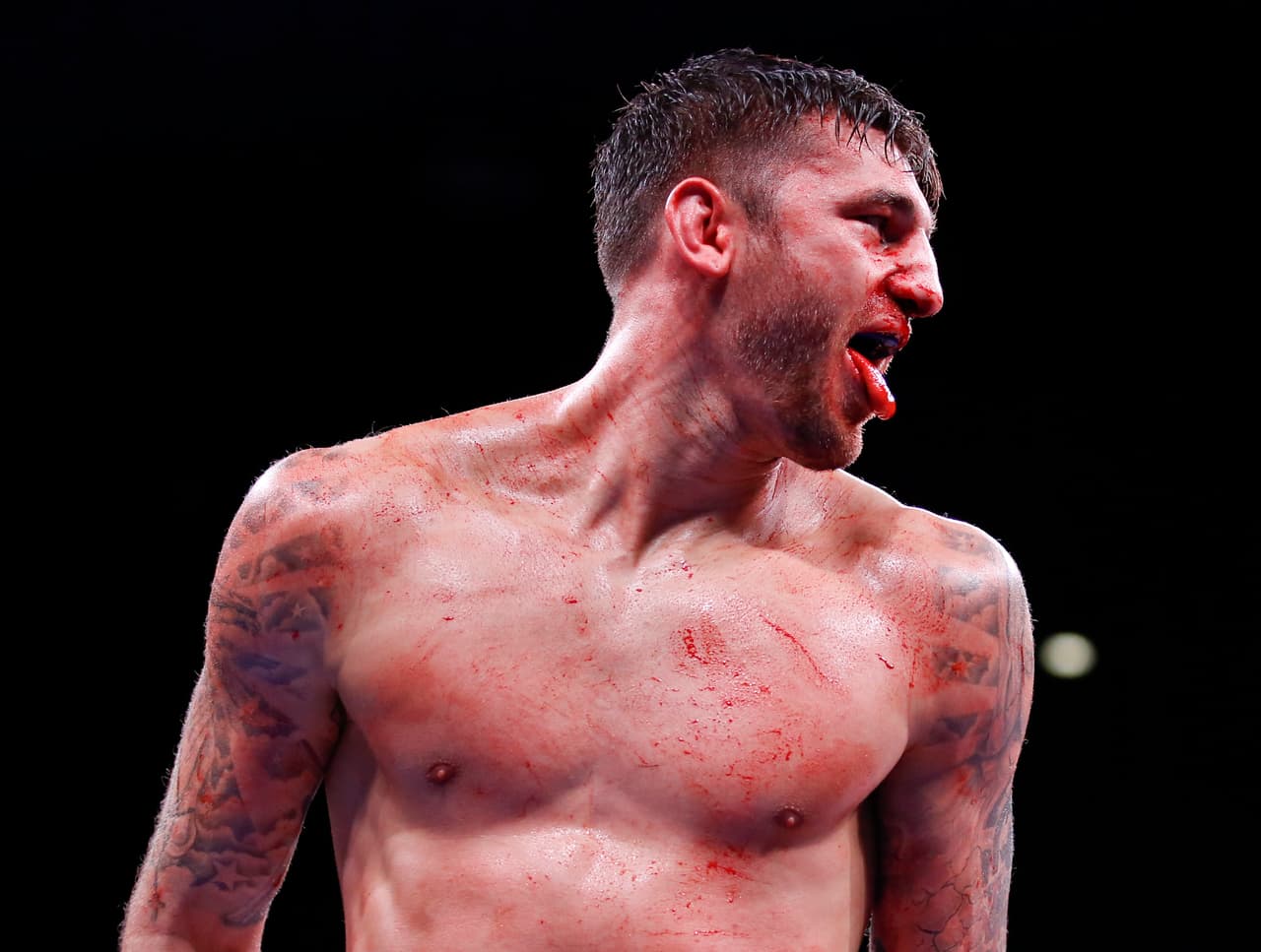 Nathan Cleverly reacts during a light heavyweight boxing bout against Andrzej Fonfara on Friday, Oct. 16, 2015, in Chicago. Fonfara won by unanimous decision. (AP Photo/Kamil Krzaczynski)