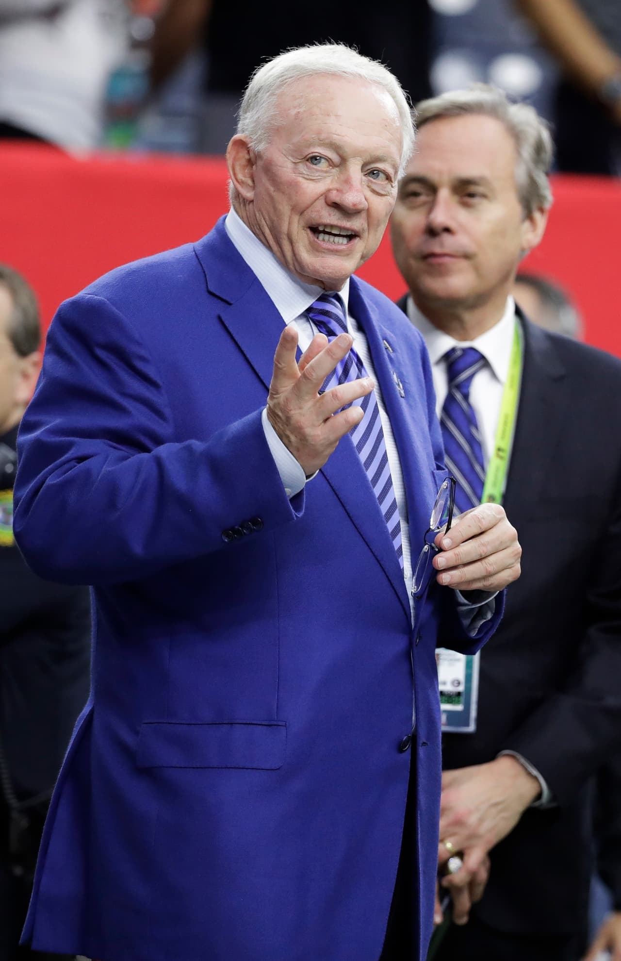 Dallas Cowboys owner Jerry Jones walks on the field before the NFL Super Bowl 51 football game between the New England Patriots and the Atlanta Falcons, Sunday, Feb. 5, 2017, in Houston. (AP Photo/Chuck Burton)