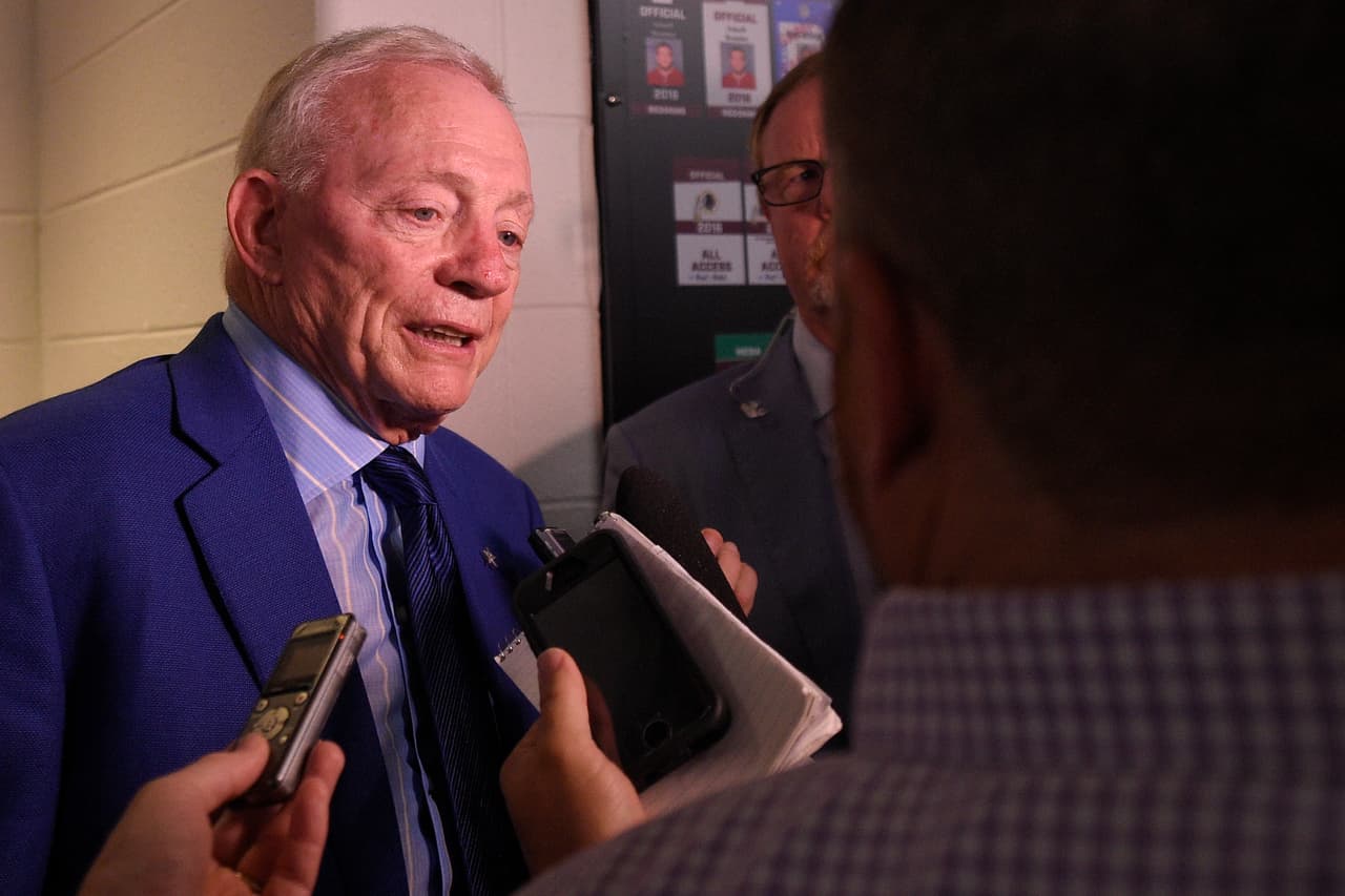 Dallas Cowboys owner Jerry Jones answers question after an NFL football game against the Washington Redskins in Landover, Md., Sunday, Sept. 18, 2016. The Cowboys defeated the Redskins 27-23. (AP Photo/Nick Wass)