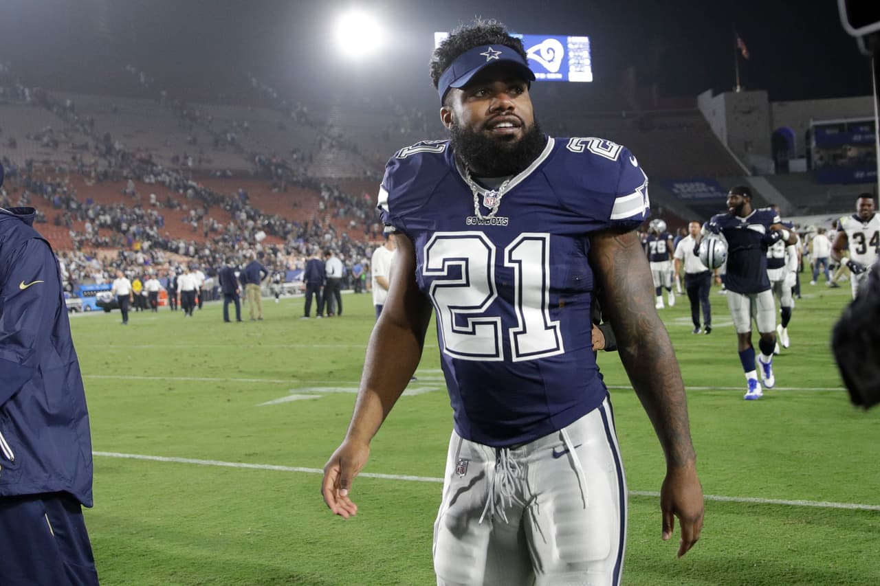 Dallas Cowboys running back Ezekiel Elliott leaves the field after a preseason NFL football game against the Los Angeles Rams Saturday, Aug. 12, 2017, in Los Angeles. (AP Photo/Jae C. Hong)