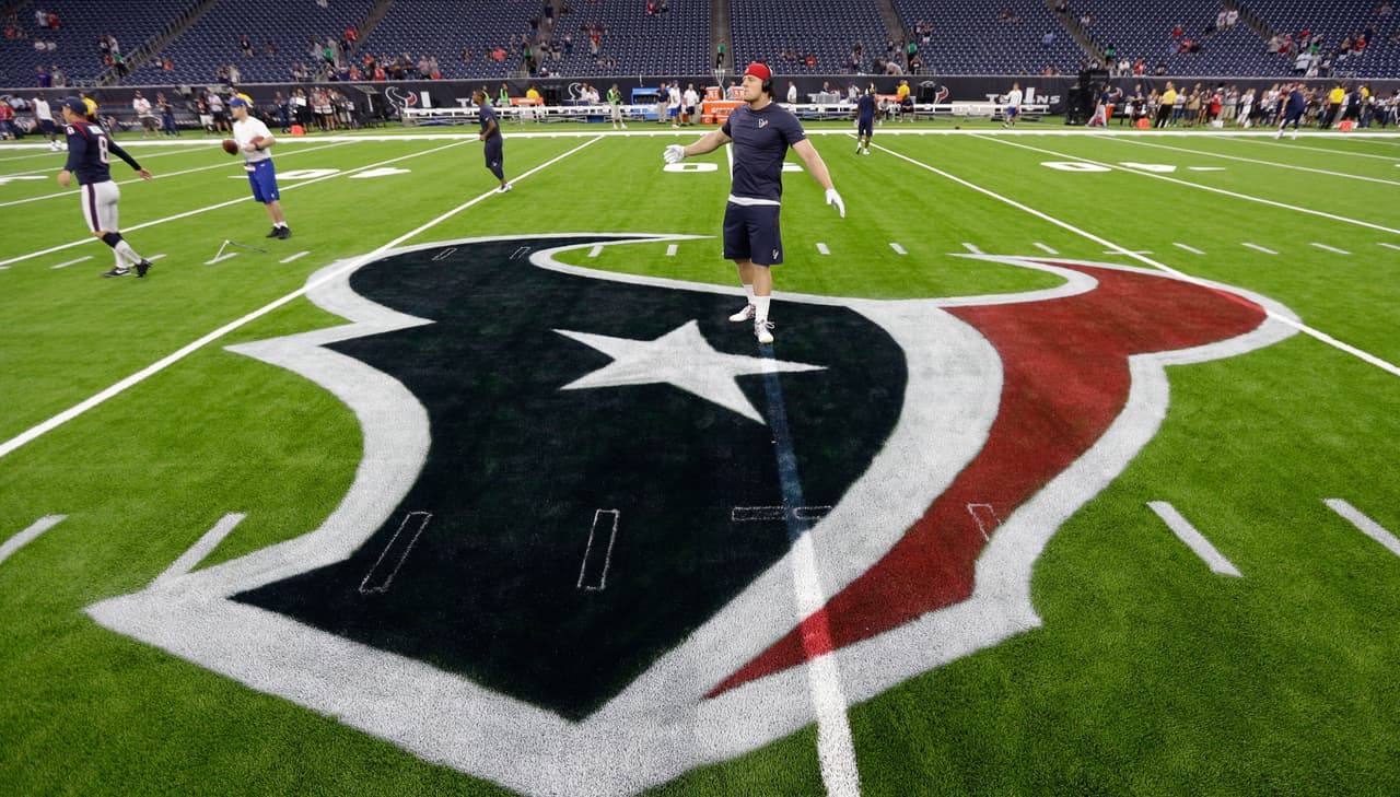 Houston Texans defensive end J.J. Watt warms up before an NFL football preseason game against the New England Patriots Saturday, Aug. 19, 2017, in Houston. (AP Photo/David J. Phillip)