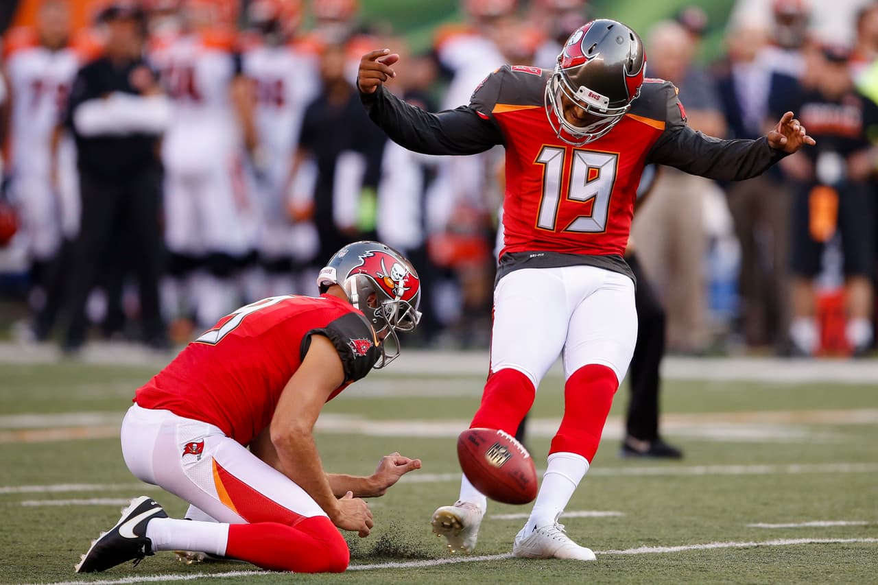 Tampa Bay Buccaneers' Roberto Aguayo (19) kicks a field goal from the hold of Bryan Anger (9) during the first half of the team's preseason NFL football game against the Cincinnati Bengals, Friday, Aug. 11, 2017, in Cincinnati. (AP Photo/Gary Landers)