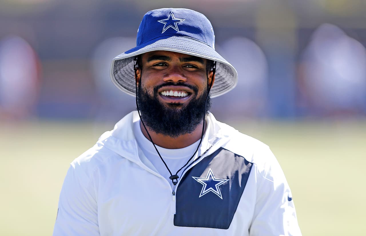 Dallas Cowboys running back Ezekiel Elliott smiles during an NFL training camp, Wednesday, July 26, 2017 in Oxnard, California. (James D Smith via AP)