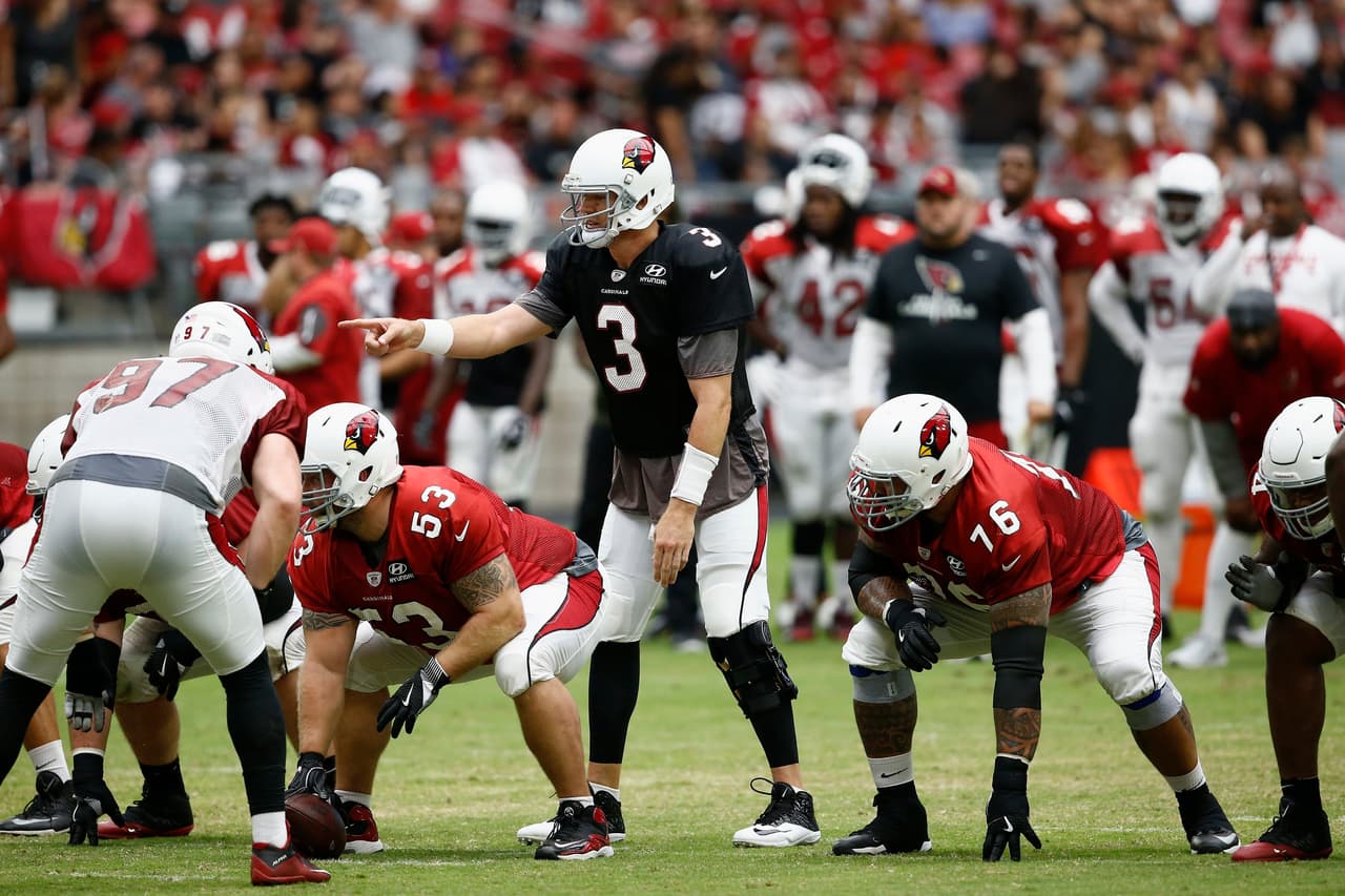 Arizona Cardinals' Carson Palmer (3) points a shouts instructions prior to the snap sduring an NFL football training camp Saturday, July 29, 2017, in Glendale, Ariz. (AP Photo/Ross D. Franklin)