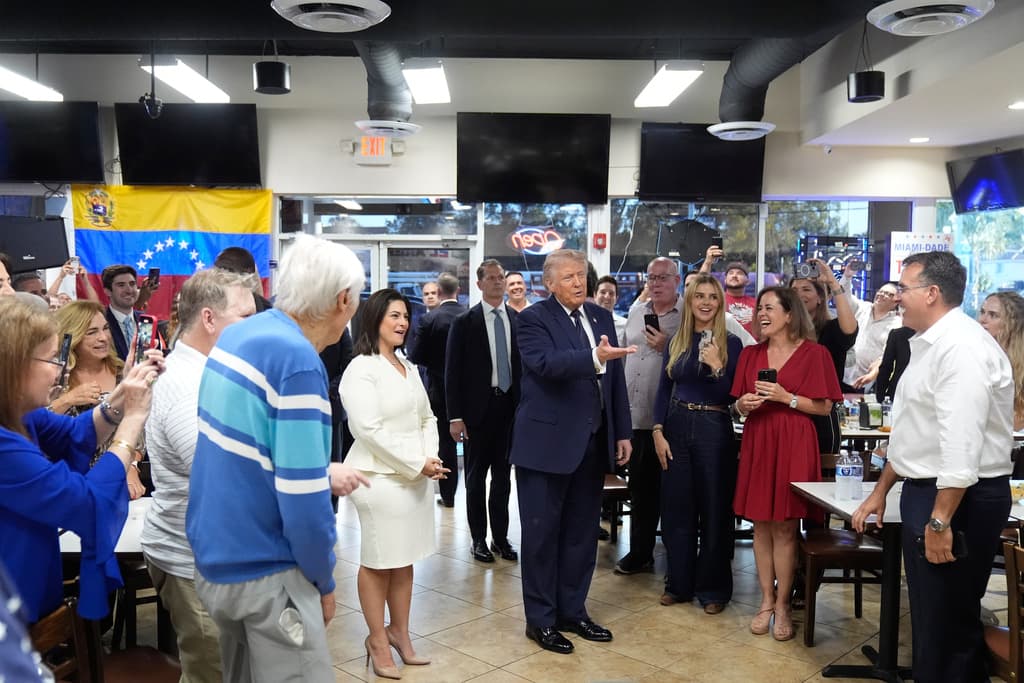 President Donald Trump speaks as he visits Venezuelan restaurant El Arepazo, Monday, March 9, 2026, in Doral, Fla. (AP Photo/Mark Schiefelbein)