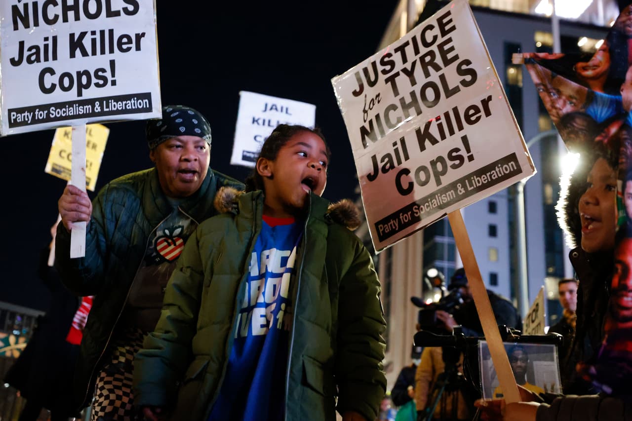 Demonstrators gather during a protest over the death of Tyre Nichols, Friday, Jan. 27, 2023, in Atlanta. (AP Photo/Alex Slitz)