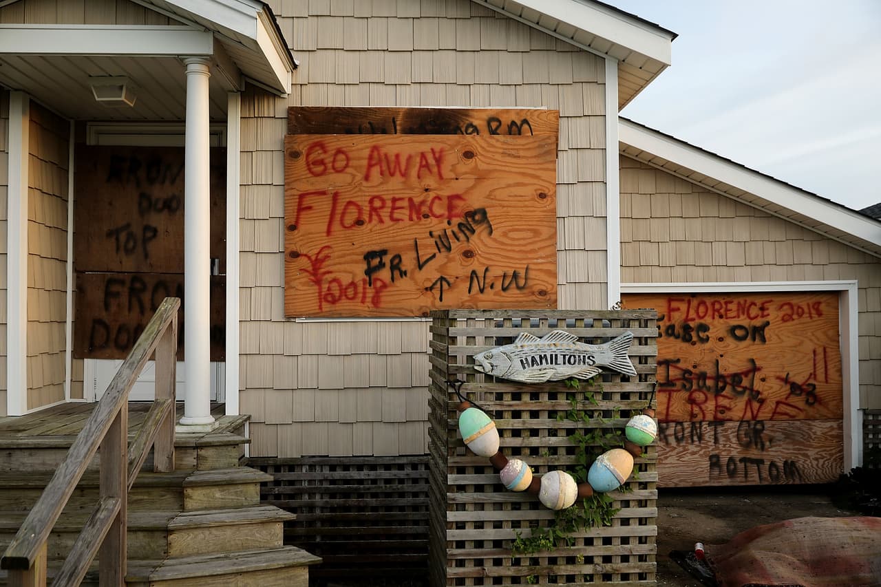 MOREHEAD CITY, NC - SEPTEMBER 12: Windows and doors are boarded up in anticipation of the arrival of Hurricane Florence September 12, 2018 in Morehead City, North Carolina. Coastal cities in North Carolina, South Carolina and Virgnian are under evacuation orders as the category 3 hurricane approaches the United States. (Photo by Chip Somodevilla/Getty Images)