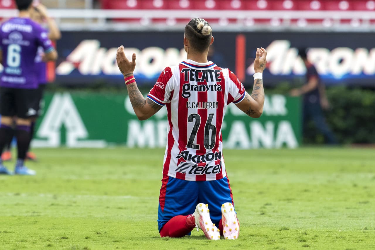 Calderón rezando previo al partido