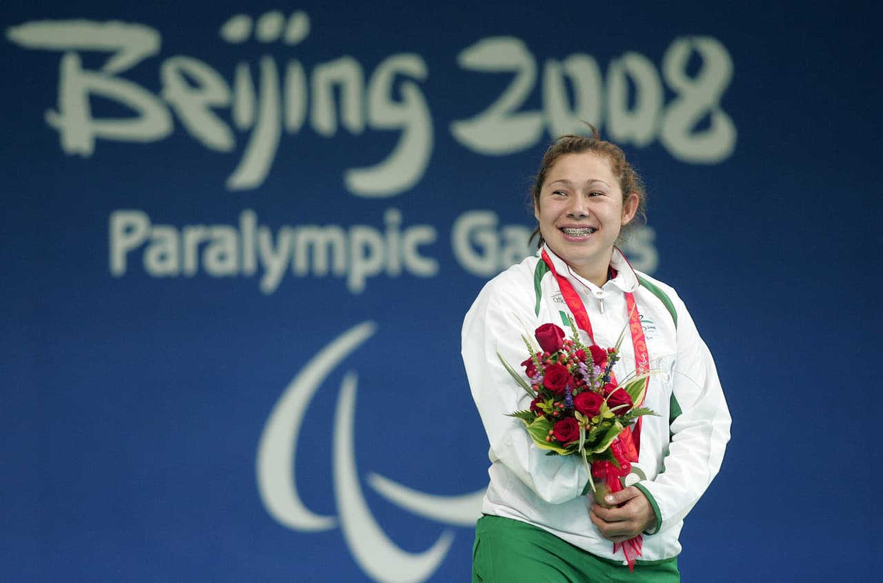 <b>DORAMITZI GONZÁLEZ -</b>
<br>La nadadora oriunda del estado de Michoacán es la máxima ganadora de preseas en Juegos Paralímpicos, con 11, que ha acumulado desde Sydney 2000. Ha ganado cinco oros, tres platas y tres bronces, todos entre sus primeros Juegos y los de Beijing 2008. Actualmente compite en sus quintos.