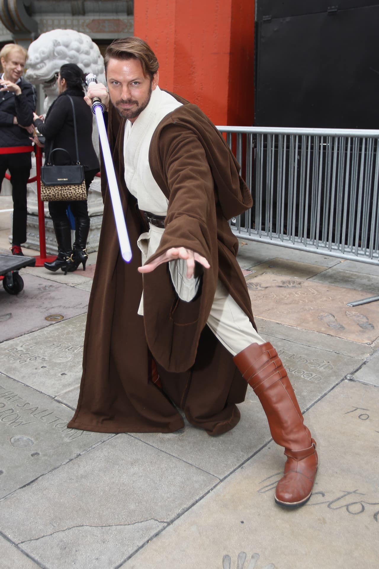 A fan poses for a photo during the costume contest of Star Wars fans lining up to see Star Wars Rogue One: A Star Wars Story at the TCL Chinese Theatre in Hollywood, California, on December 15, 2016. / AFP / TOMMASO BODDI (Photo credit should read TOMMASO BODDI/AFP/Getty Images)
