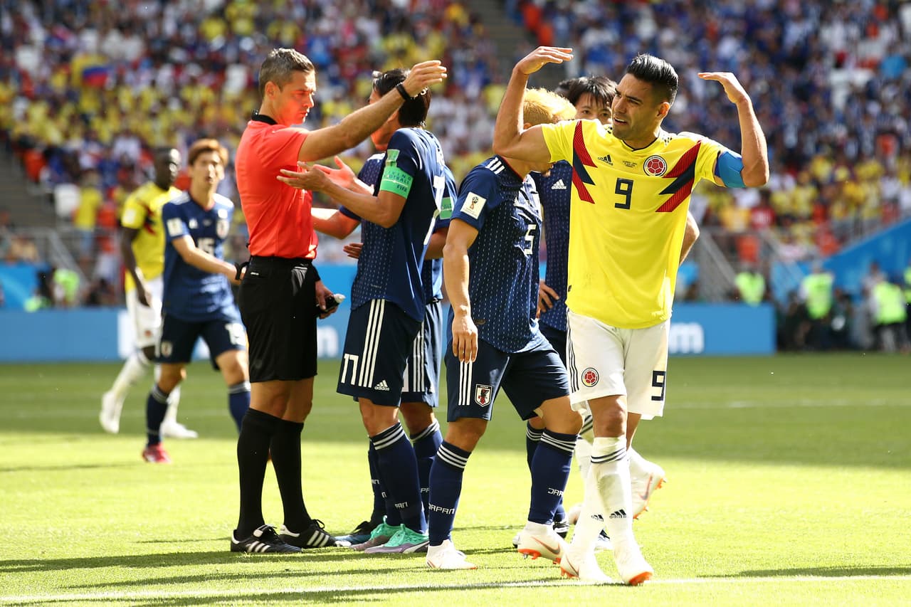 SARANSK, RUSSIA - JUNE 19: Radamel Falcao of Colombia celebrates after teammate Juan Quintero scores their sides first goal during the 2018 FIFA World Cup Russia group H match between Colombia and Japan at Mordovia Arena on June 19, 2018 in Saransk, Russia. (Photo by Jan Kruger/Getty Images)