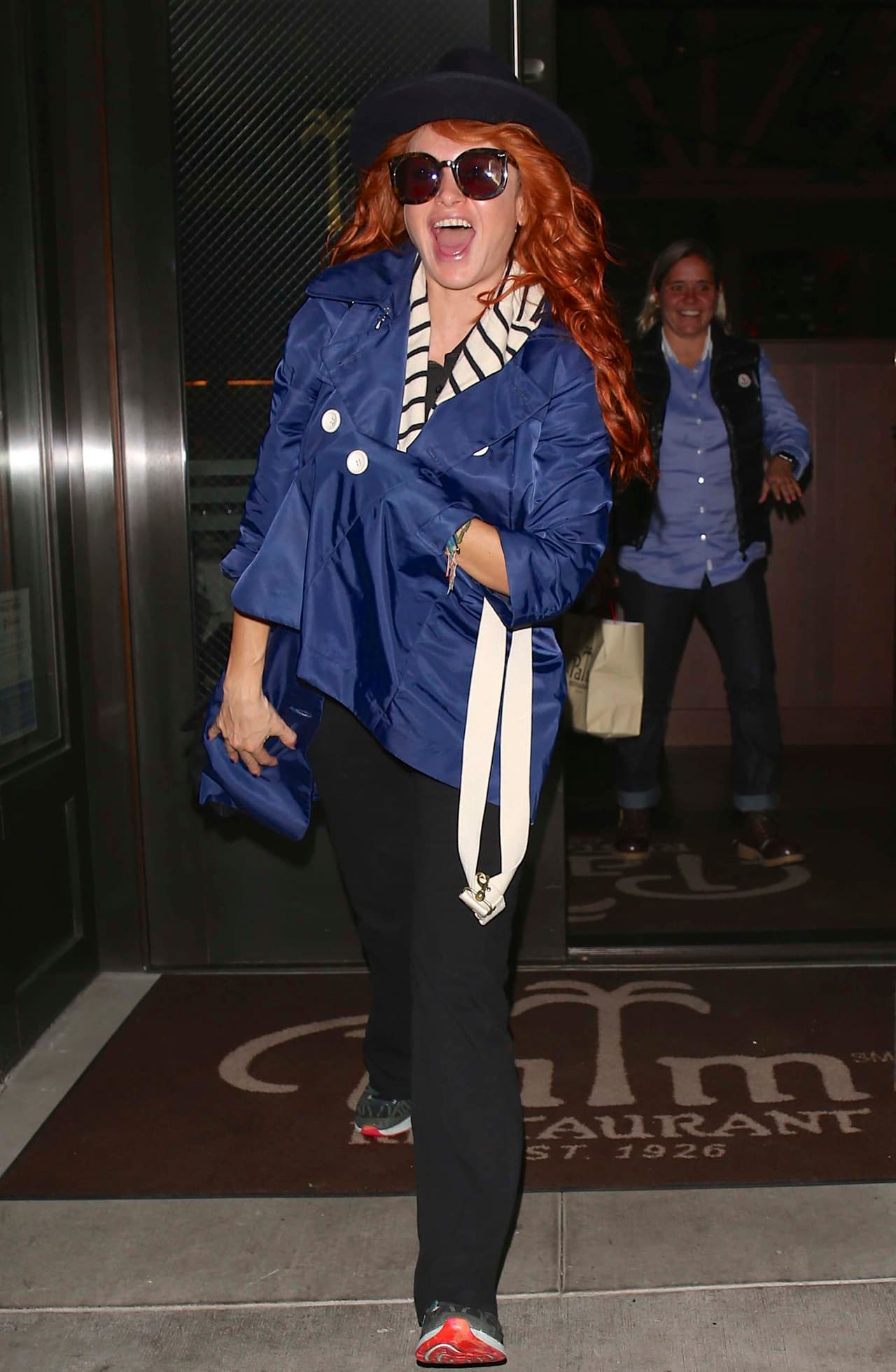 Nos topamos a Paulina Rubio muuuy contentota.