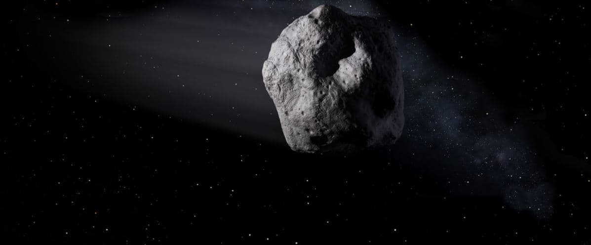 Esta ilustración muestra un asteroide cercano a la Tierra como el asteroide 2020 SW viajando a través del espacio.
<br>