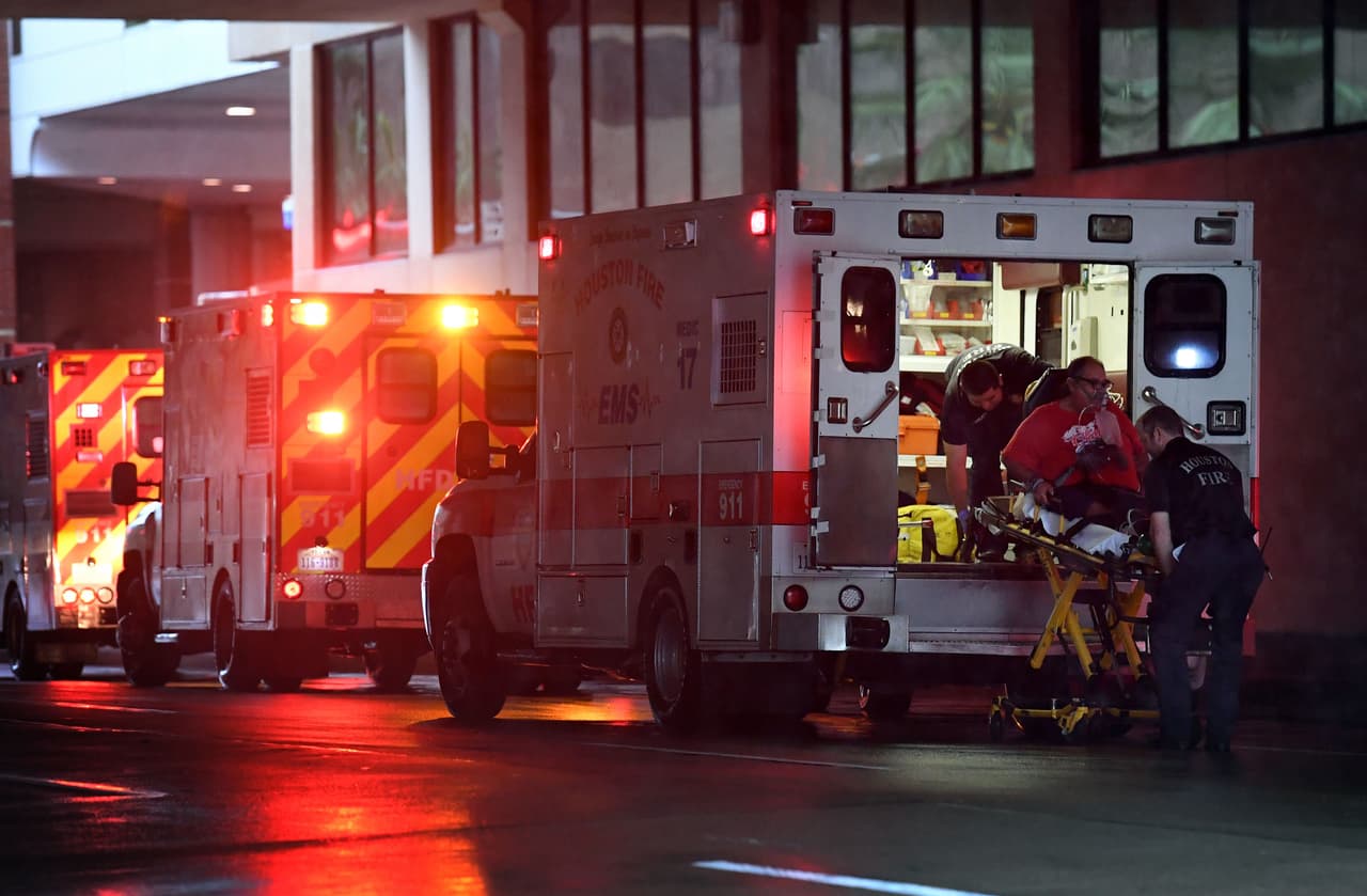 A patient is taken to the St. Josephs hospital after evacuating when Hurricane Harvey caused heavy flooding in Houston, Texas on August 28, 2017. Rescue teams in boats, trucks and helicopters scrambled Monday to reach hundreds of Texans marooned on flooded streets in and around the city of Houston before monster storm Harvey returns. / AFP PHOTO / MARK RALSTON (Photo credit should read MARK RALSTON/AFP/Getty Images)