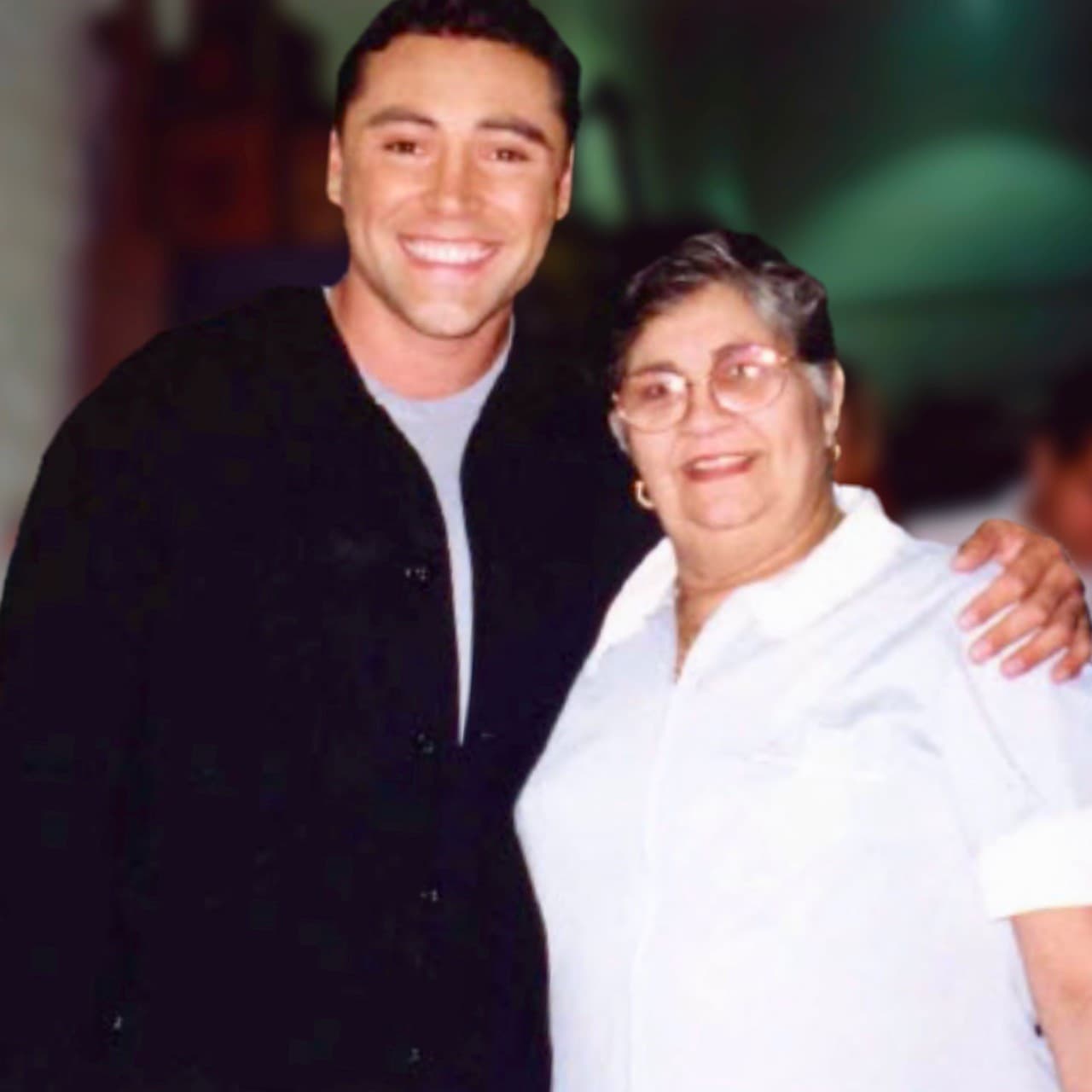 Junto al boxeador Óscar de la Hoya.